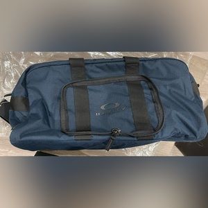 Blue Oakley Duffle bag with tags